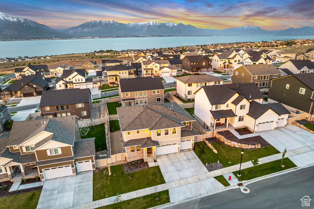 Aerial view at dusk of a mountain view and a residential view