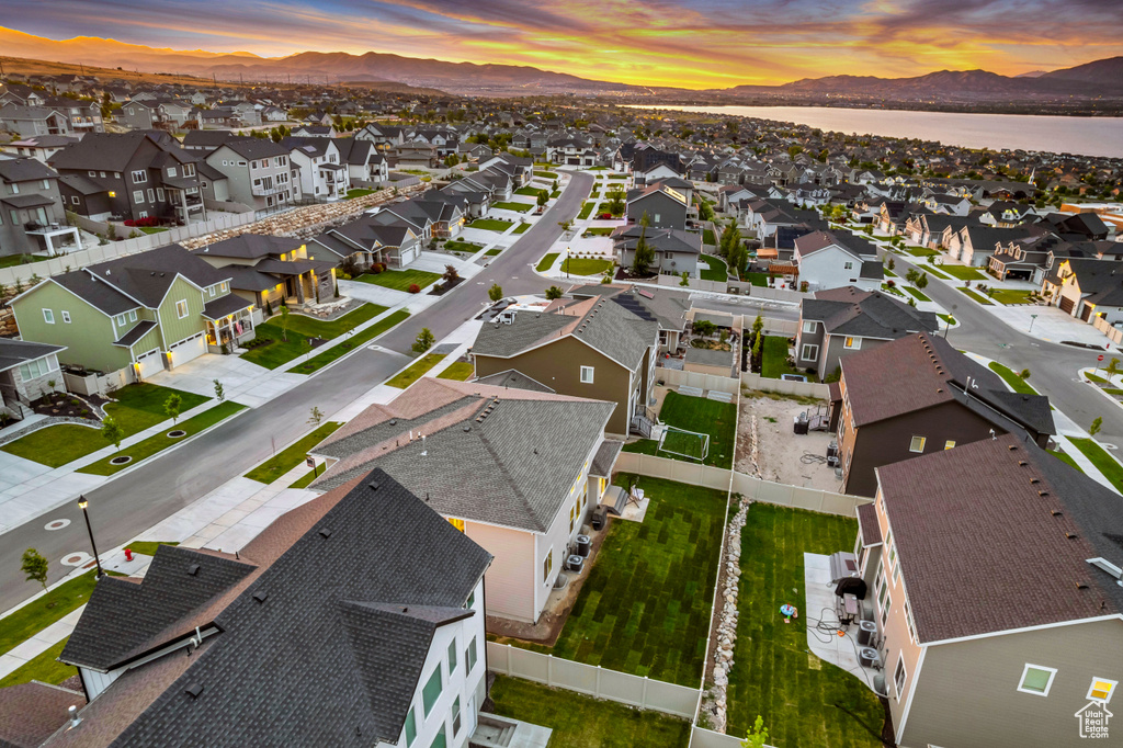 Aerial view of residential area with a mountainous background