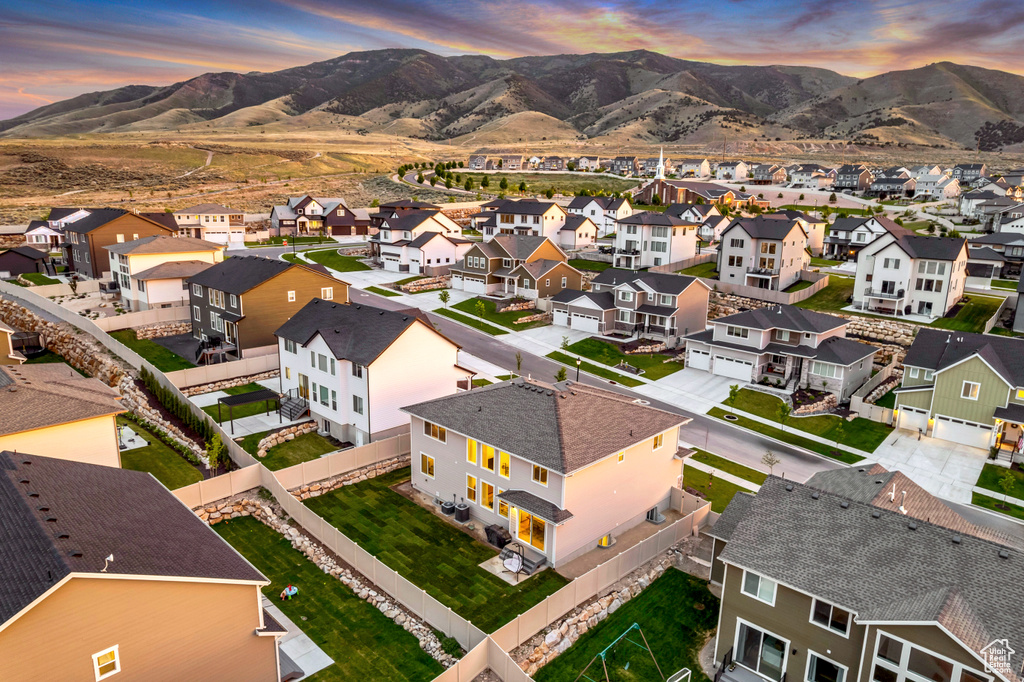 Aerial perspective of suburban area with mountains