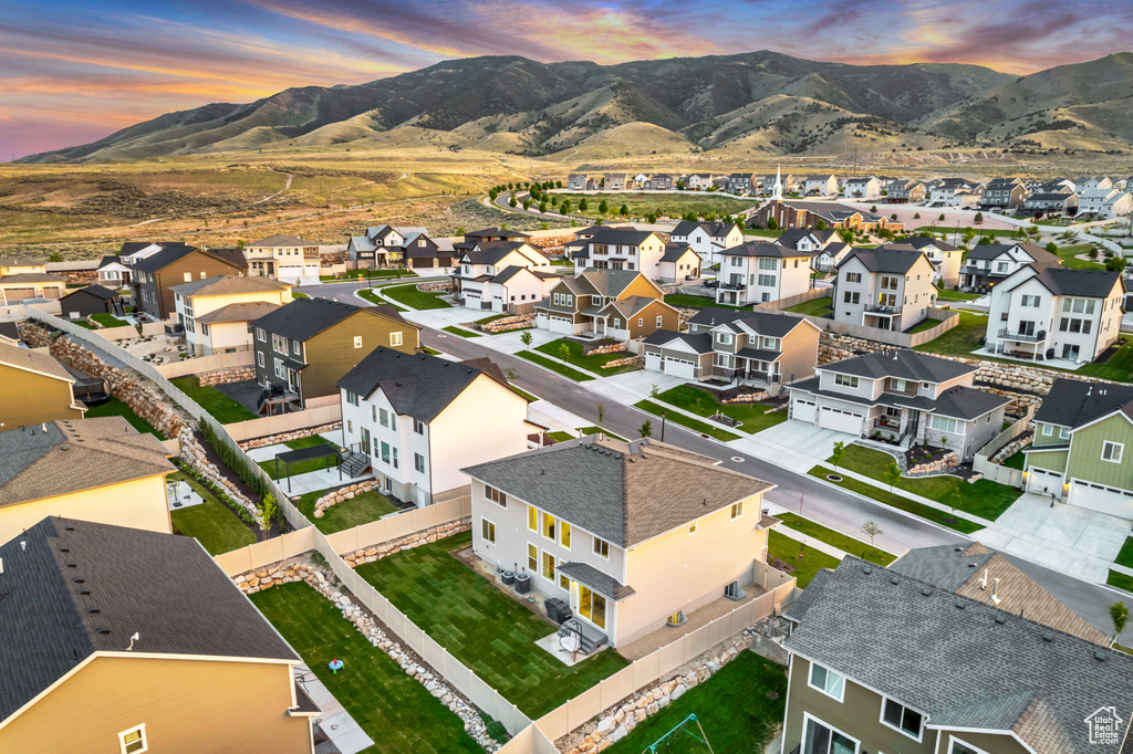 Aerial view at dusk of a mountain view and a residential view
