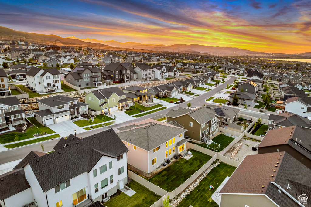 Aerial view at dusk of a residential view and a mountain view