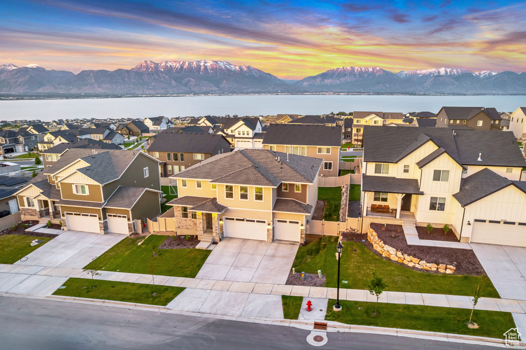 Aerial view of residential area with a water and mountain view