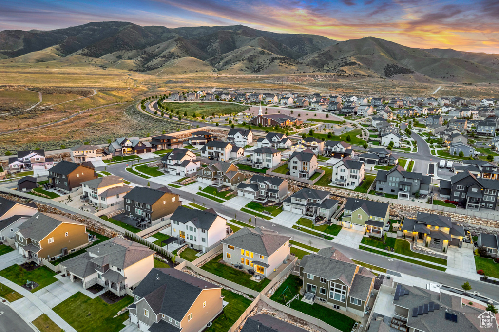 View of property location with a mountainous background and nearby suburban area
