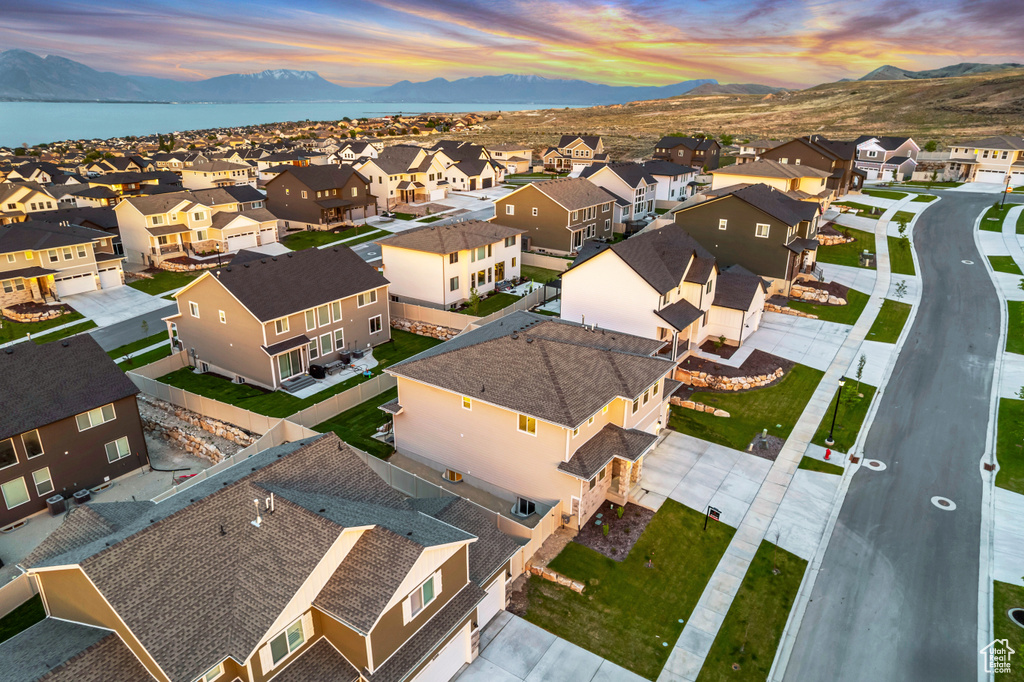 Aerial view at dusk of a residential view and a mountain view