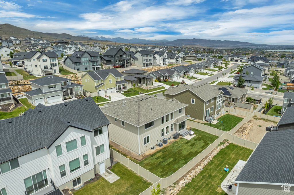 Aerial view of residential area with mountains
