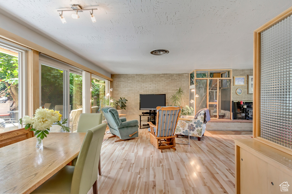 Wooden terrace featuring outdoor dining space