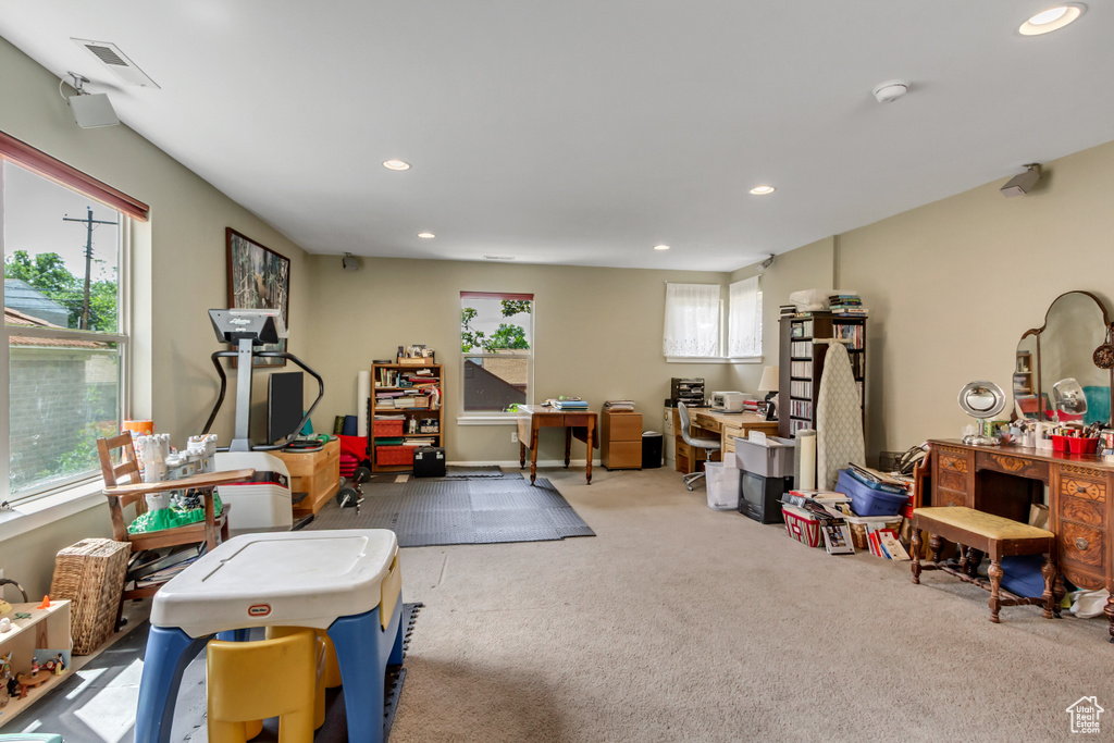 Playroom featuring carpet flooring, healthy amount of natural light, and recessed lighting