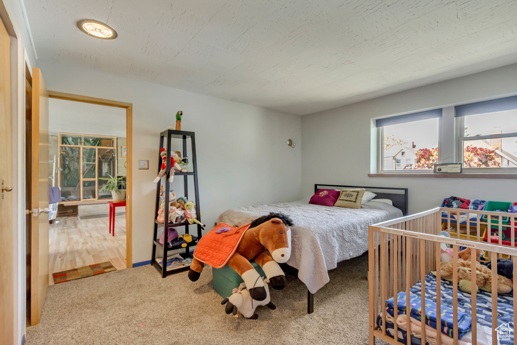 Bedroom featuring carpet floors