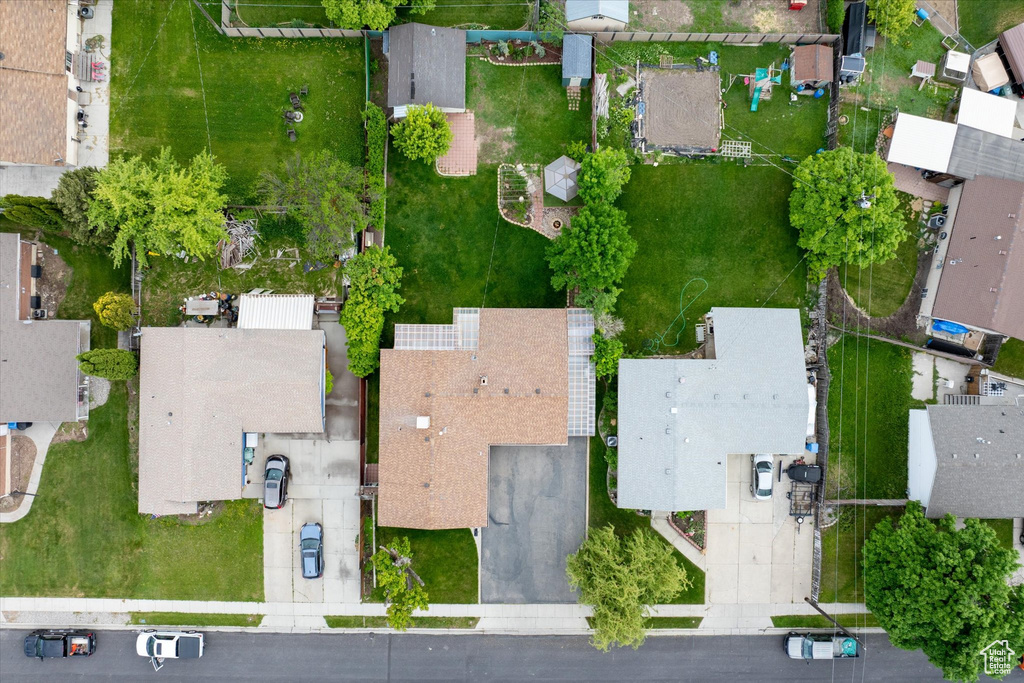 Aerial view of property's location with nearby suburban area