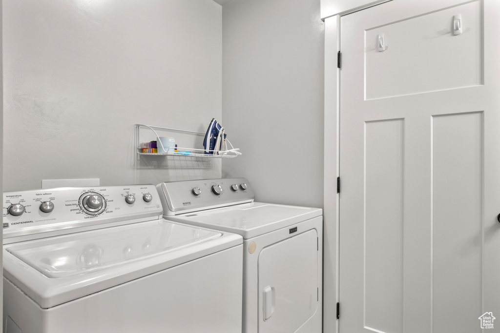 Laundry room with separate washer and dryer