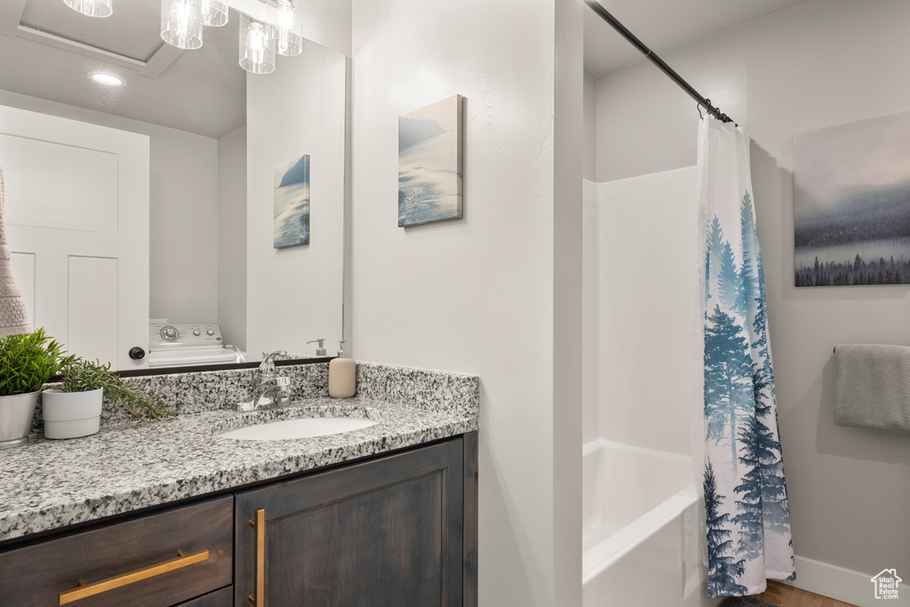 Full bath with vanity and recessed lighting