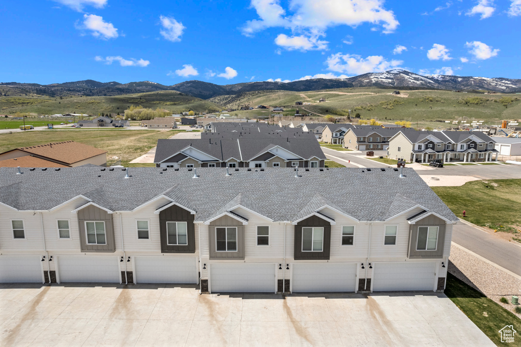 Aerial perspective of suburban area with mountains