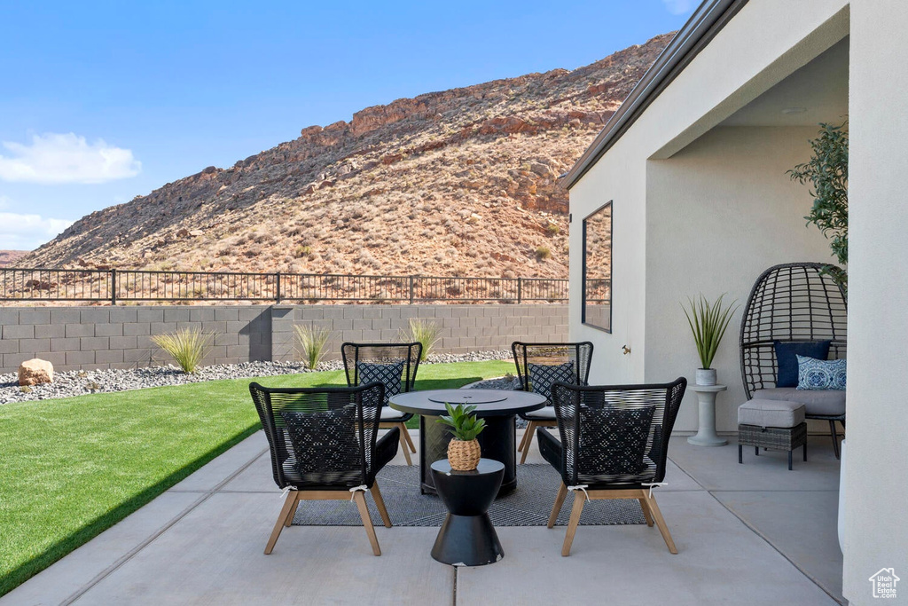 View of patio / terrace with a mountain view