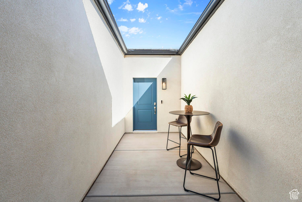 Property entrance with stucco siding