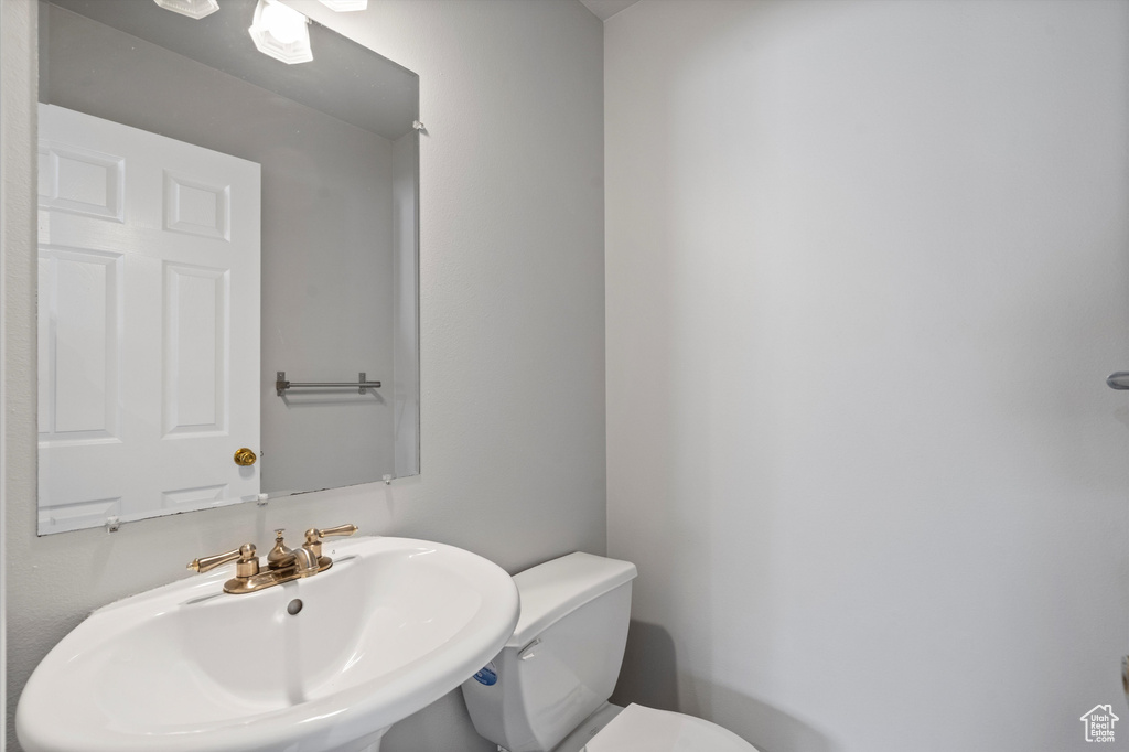 Bathroom with a sink and toilet