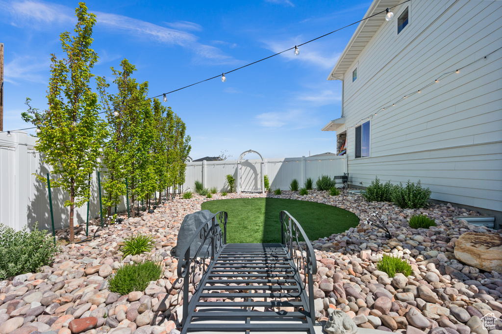 View of fenced backyard