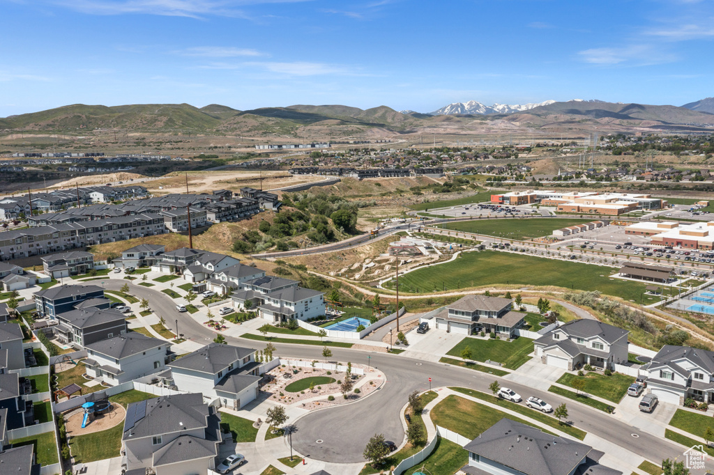 Aerial view of property\'s location with mountains and nearby suburban area
