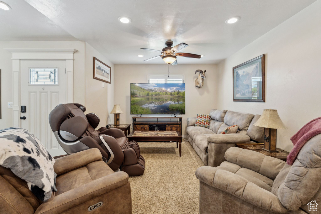 Living area featuring ceiling fan, recessed lighting, and healthy amount of natural light