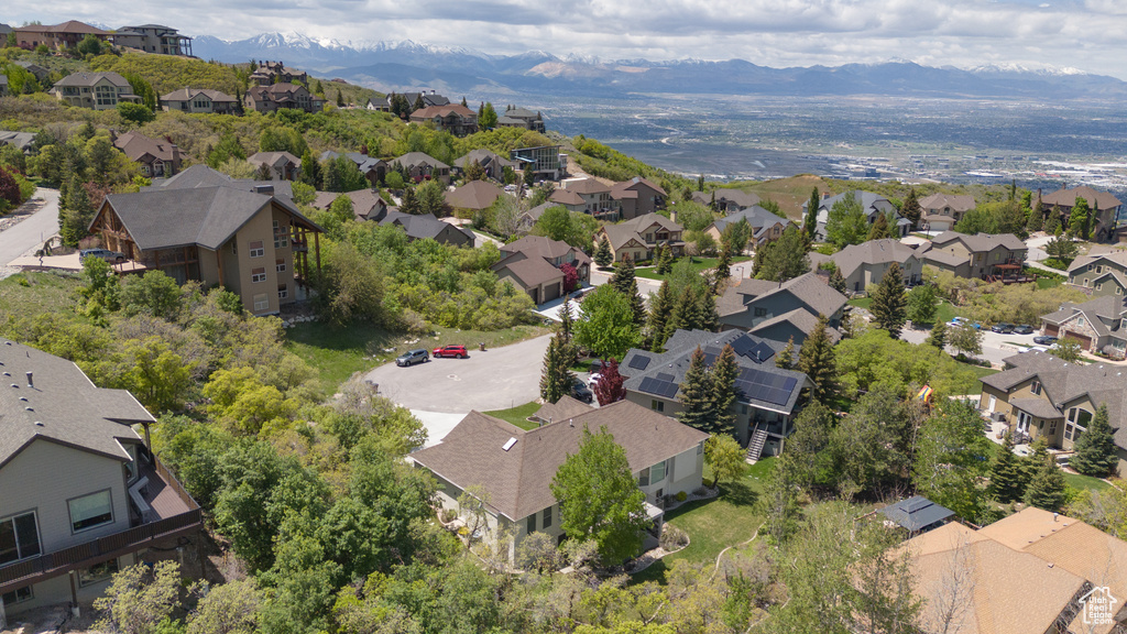 Aerial view of residential area with mountains