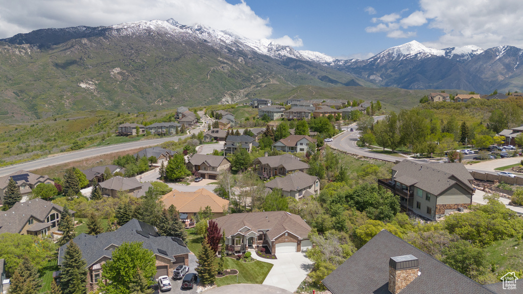 Aerial view of residential area with a mountainous background