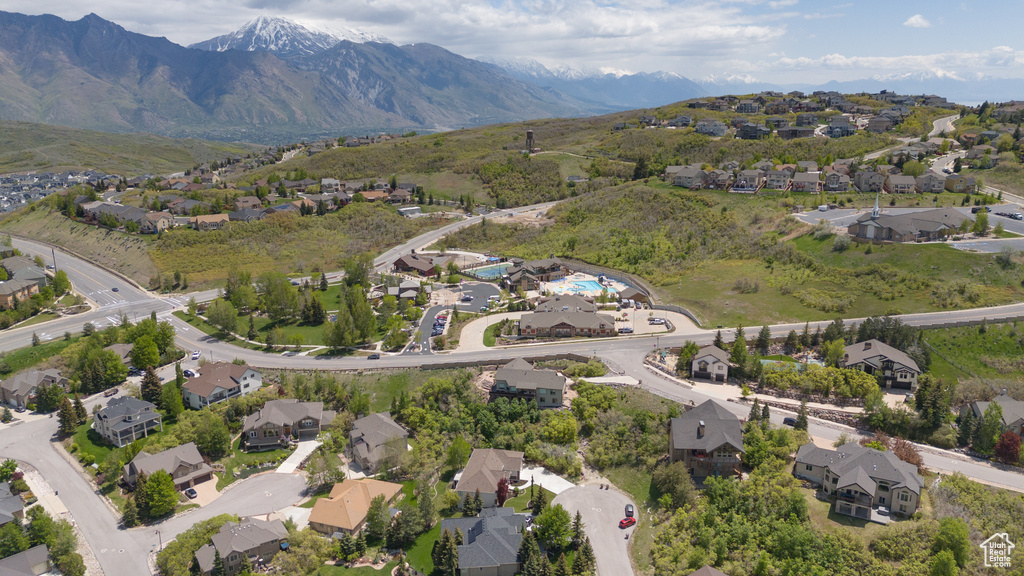 View of property location with nearby suburban area and mountains