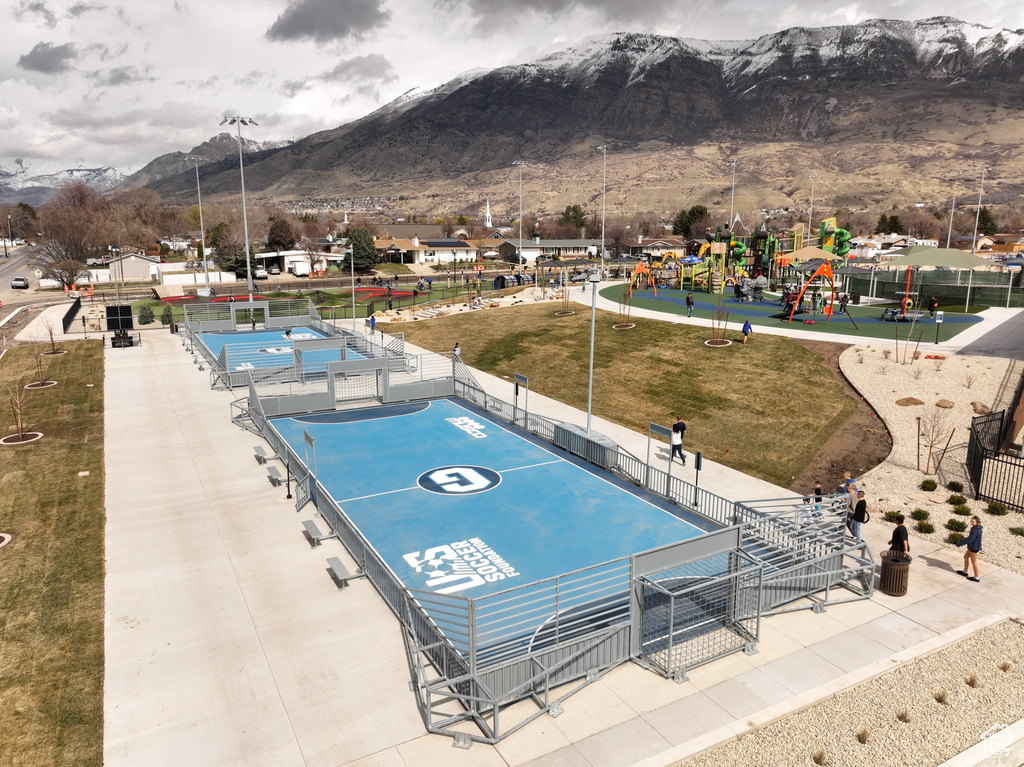 View of swimming pool with a mountain view