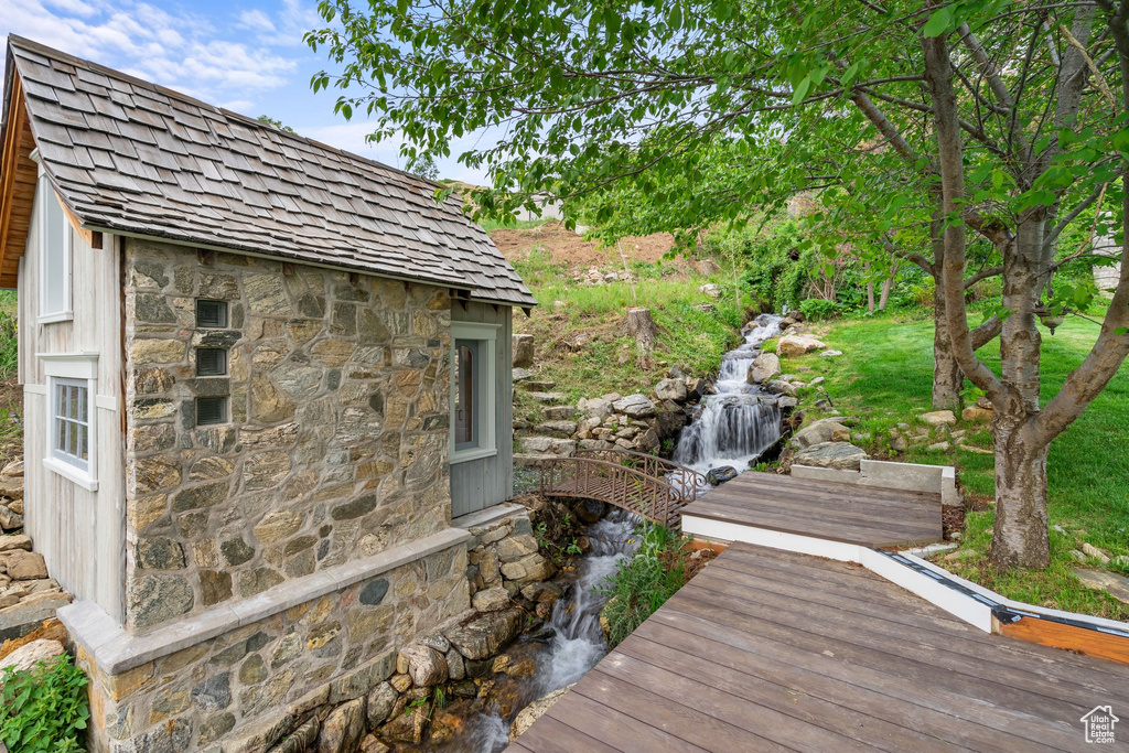 Wooden terrace with an outbuilding