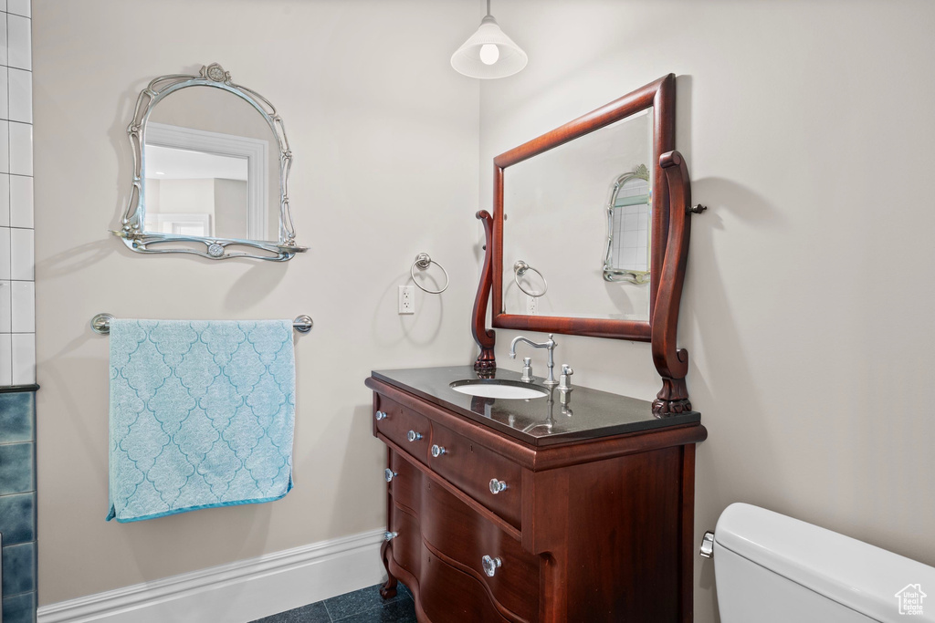 Bathroom featuring toilet and vanity