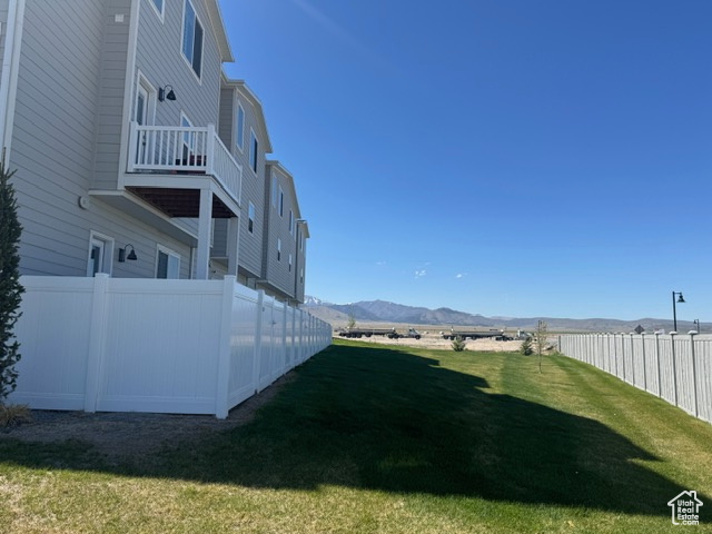 View of yard with a mountain view