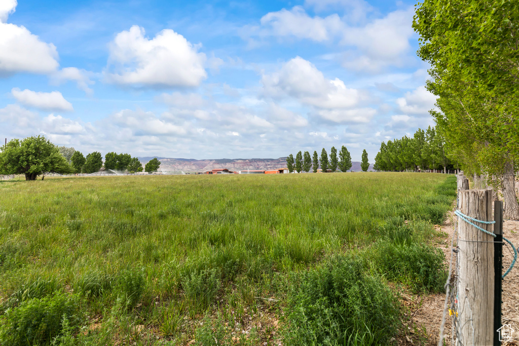 View of yard with a view of countryside