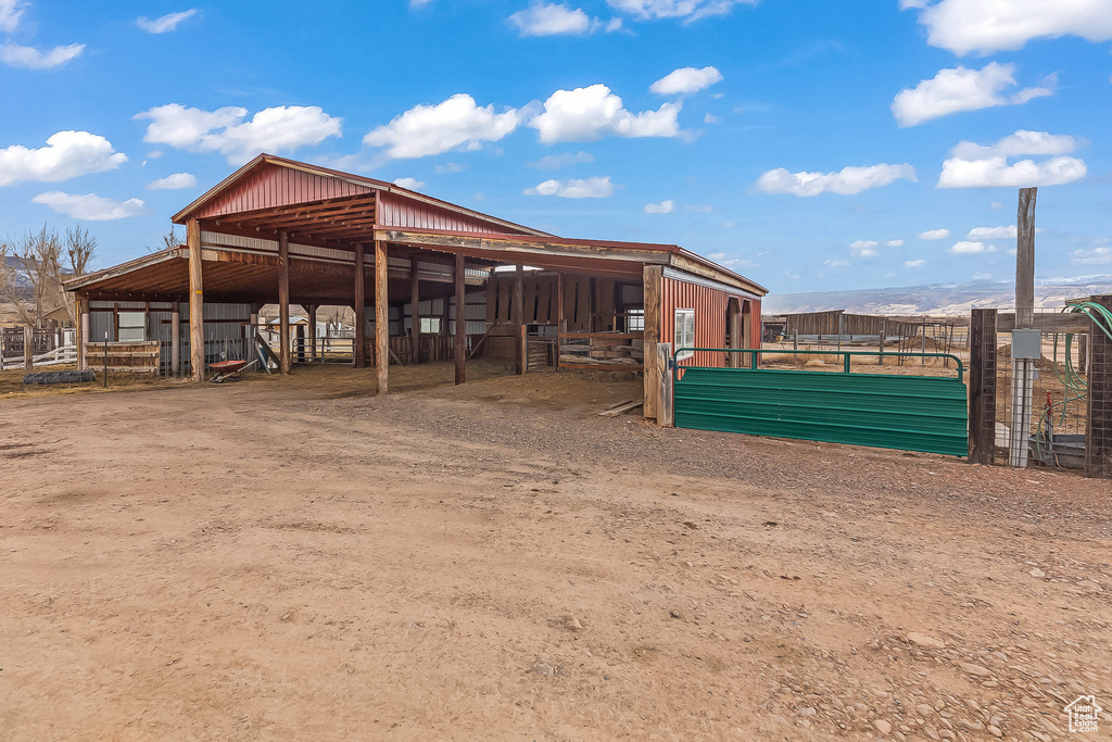 Stable featuring a mountain view