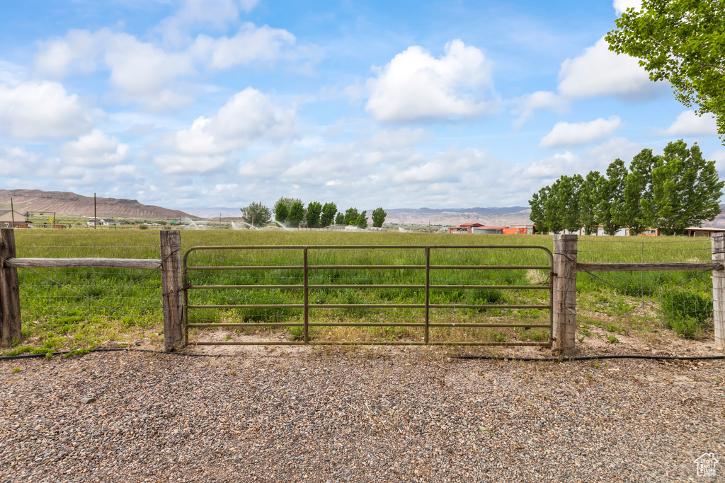 Gate with a view of rural / pastoral area and a mountain view