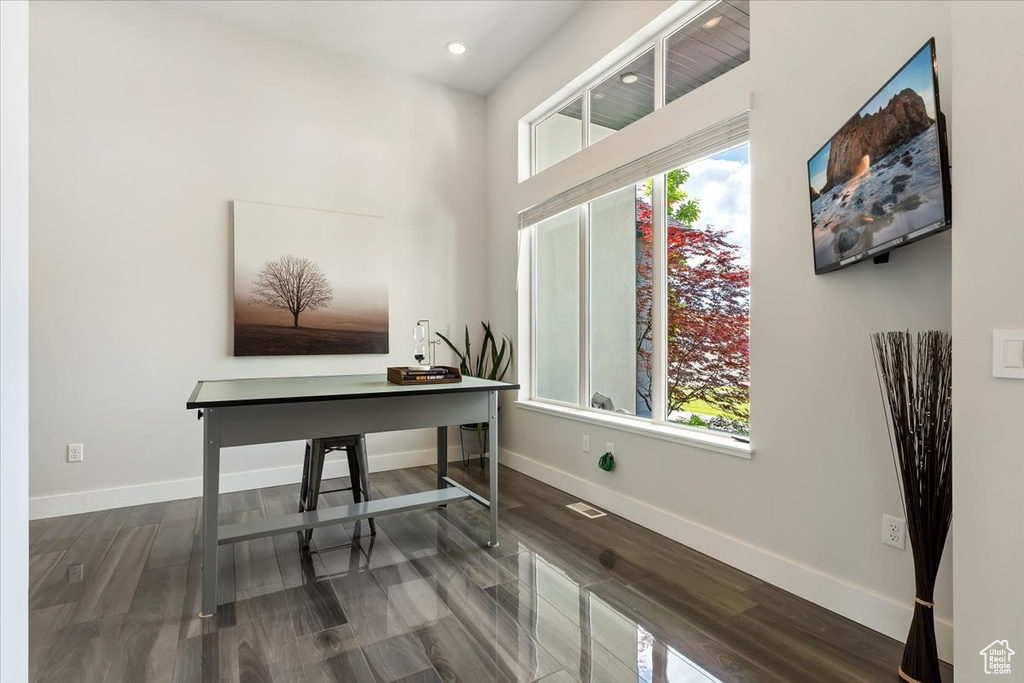 Office with baseboards, wood finished floors, and recessed lighting