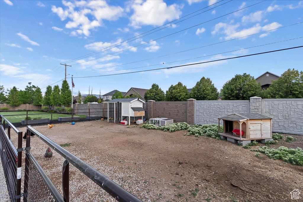 View of yard with exterior structure