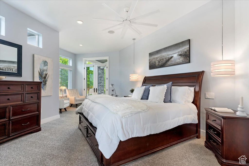 Bedroom featuring light carpet, baseboards, and recessed lighting
