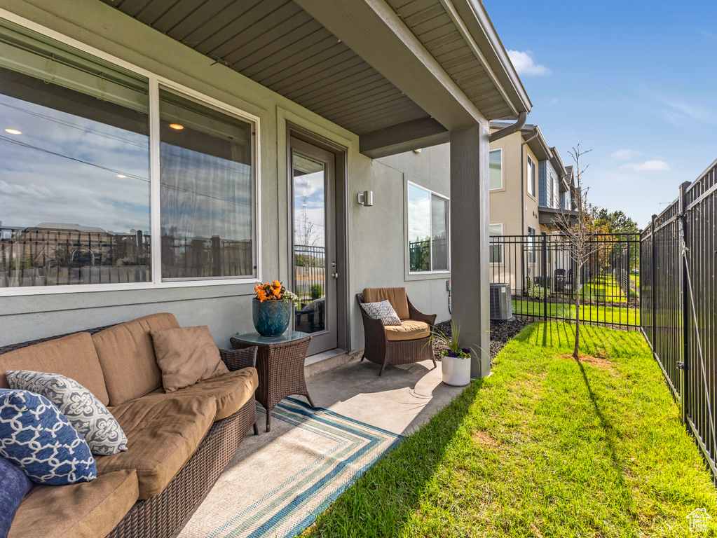 View of patio / terrace featuring central AC unit and outdoor lounge area