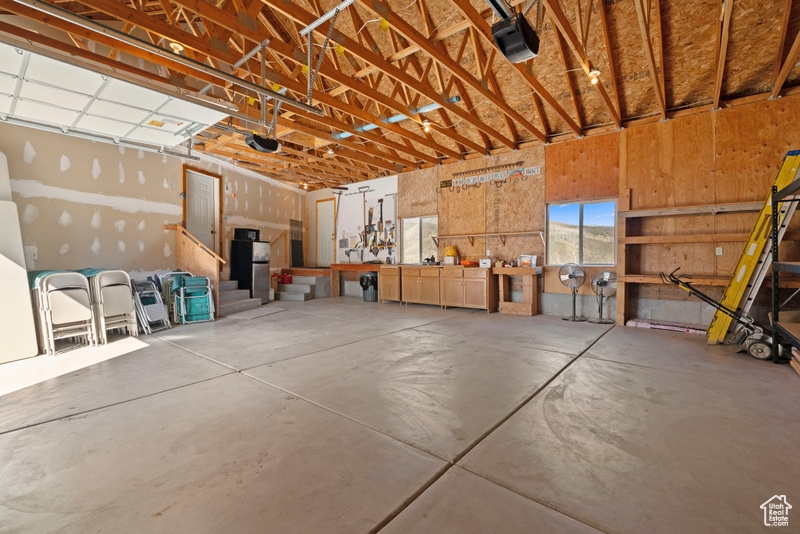 Garage featuring a garage door opener