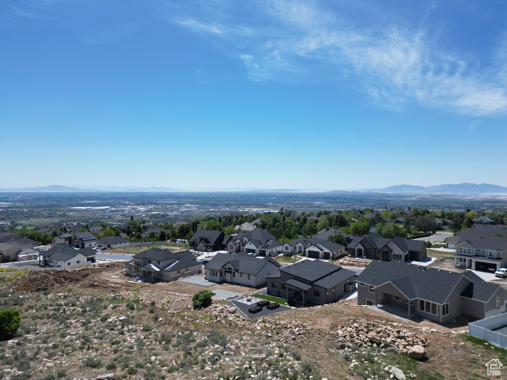 Aerial view of residential area with a mountain backdrop