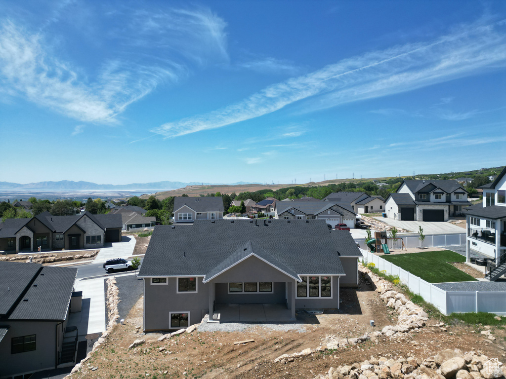 Aerial view of residential area with mountains