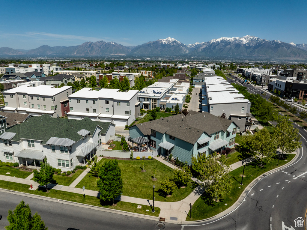 Aerial view of residential area featuring mountains