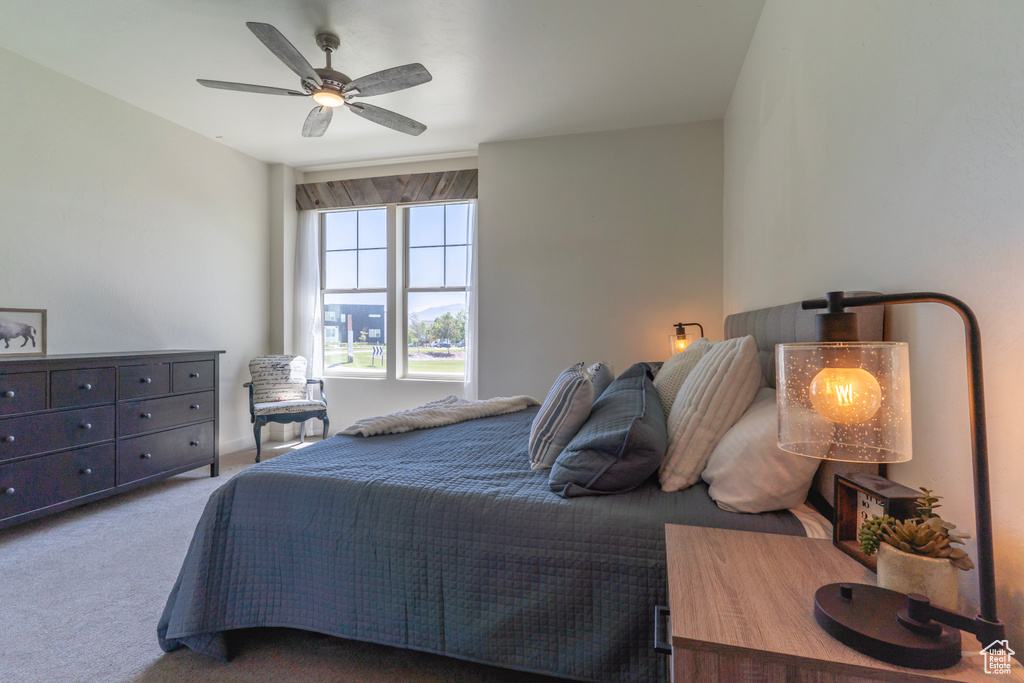 Bedroom featuring carpet floors and a ceiling fan