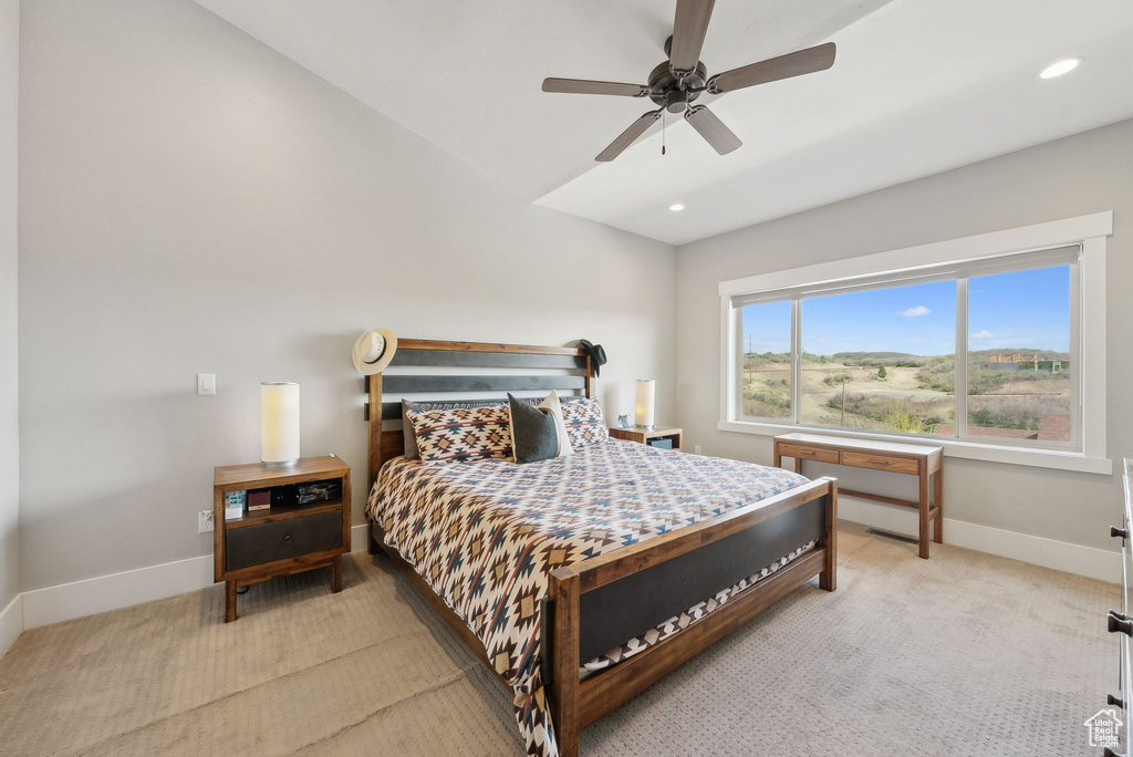 Bedroom featuring baseboards, light colored carpet, recessed lighting, and a ceiling fan