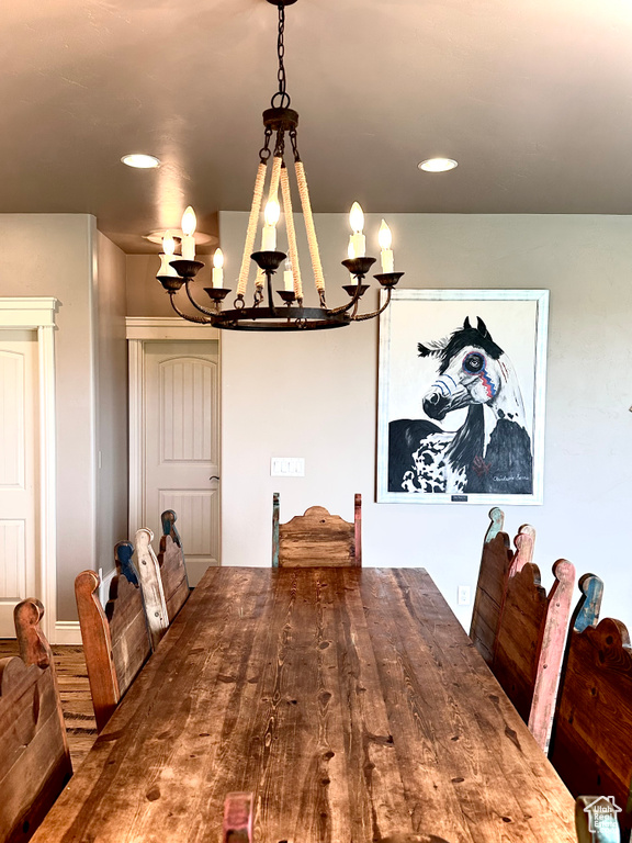 Dining room featuring a chandelier and recessed lighting