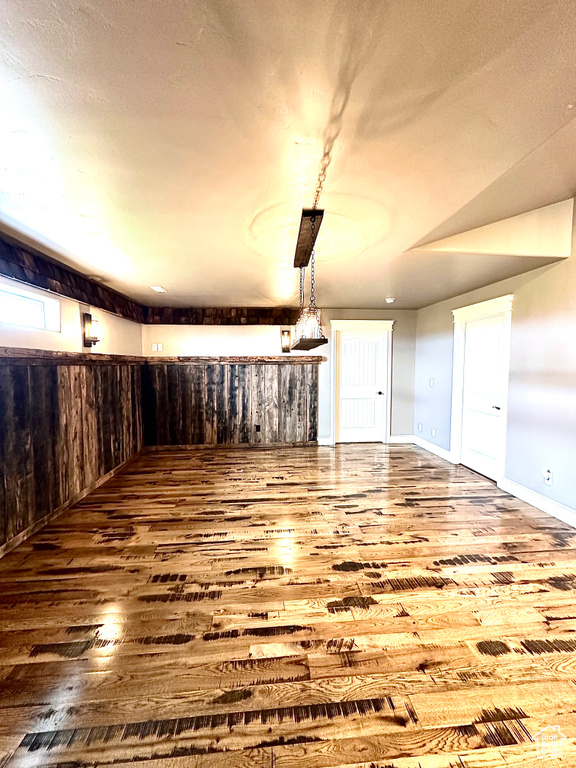 Unfurnished living room with hardwood / wood-style floors