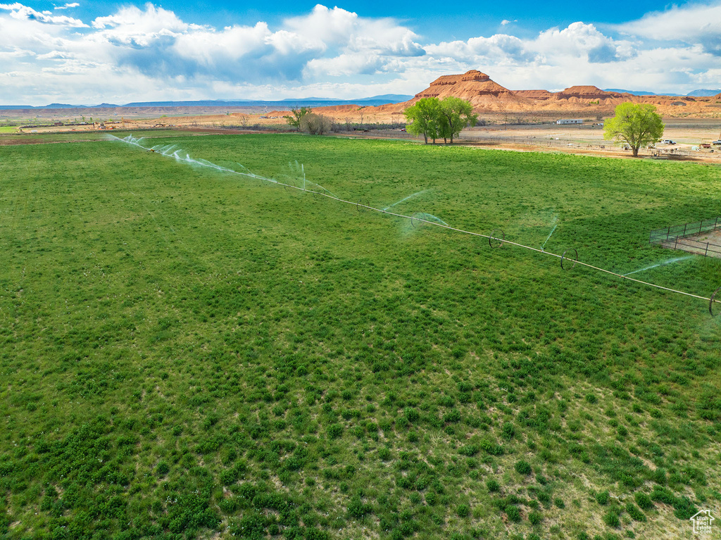 View of yard featuring a view of rural / pastoral area and a mountain view