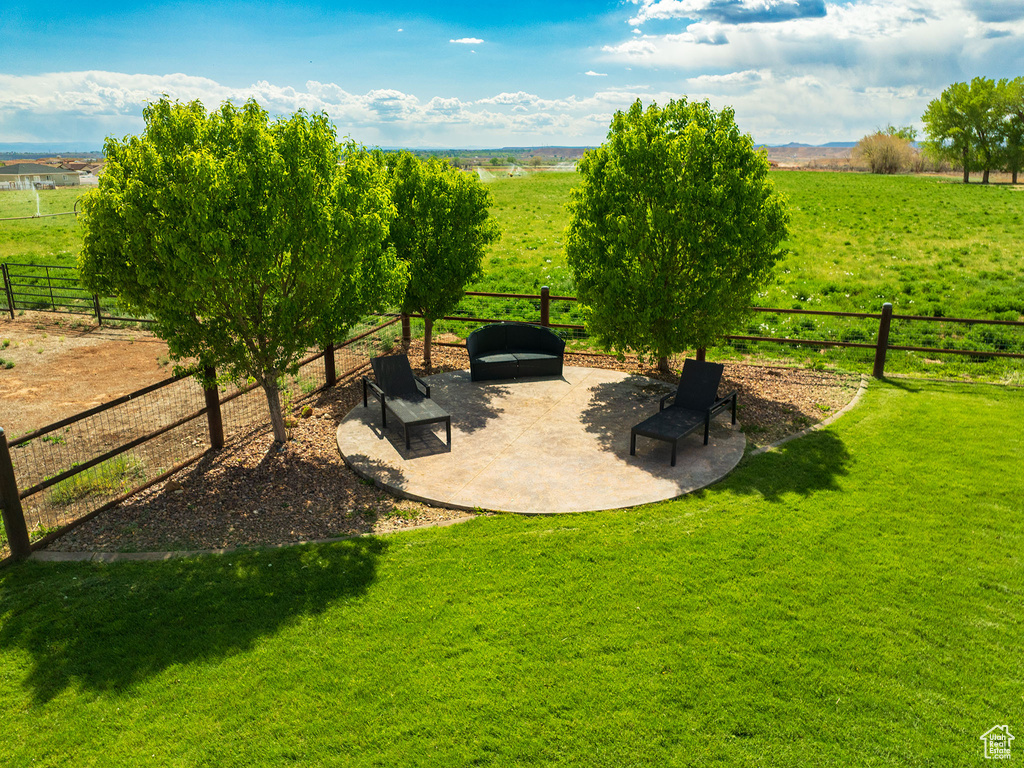 View of yard with a view of countryside and a patio