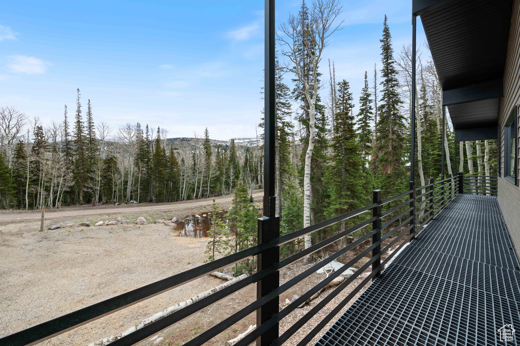 Balcony with a wooded view