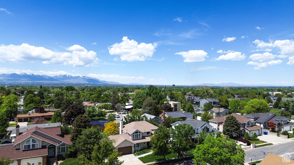 Aerial perspective of suburban area with mountains