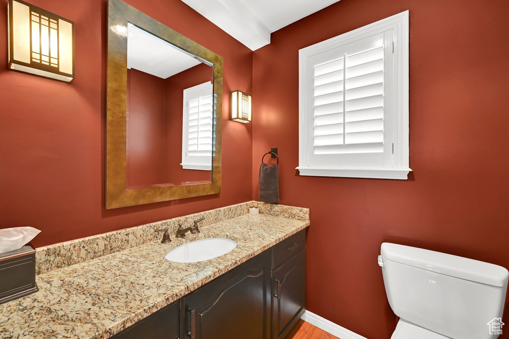 Bathroom featuring toilet and vanity