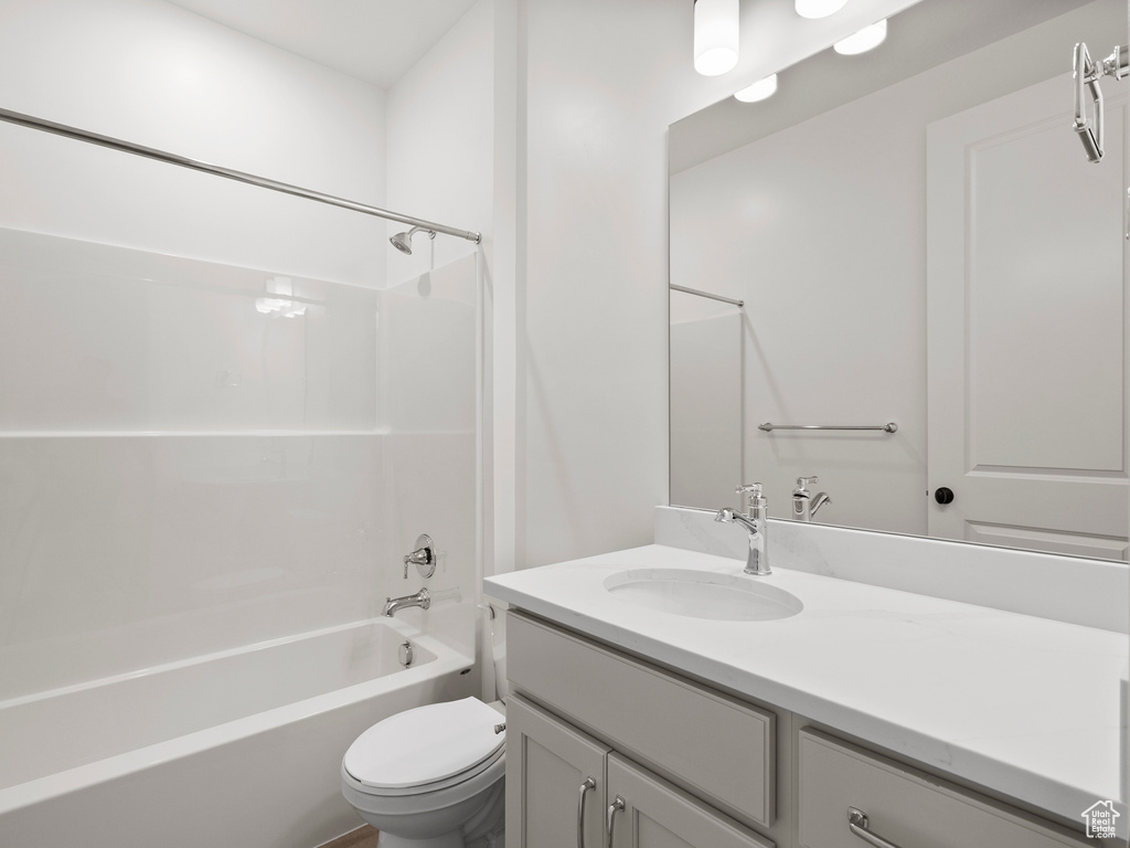 Full bath with vanity and bathtub / shower combination